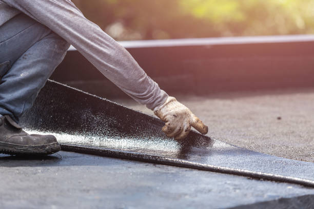 Professional Waterproofing technician working in Minneapolis, MN